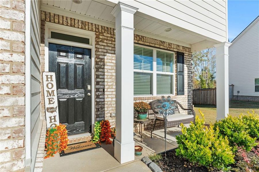 Exterior details and patio area of a home in Locust Grove Station - Pine Valley, Locust Grove (Image 3).