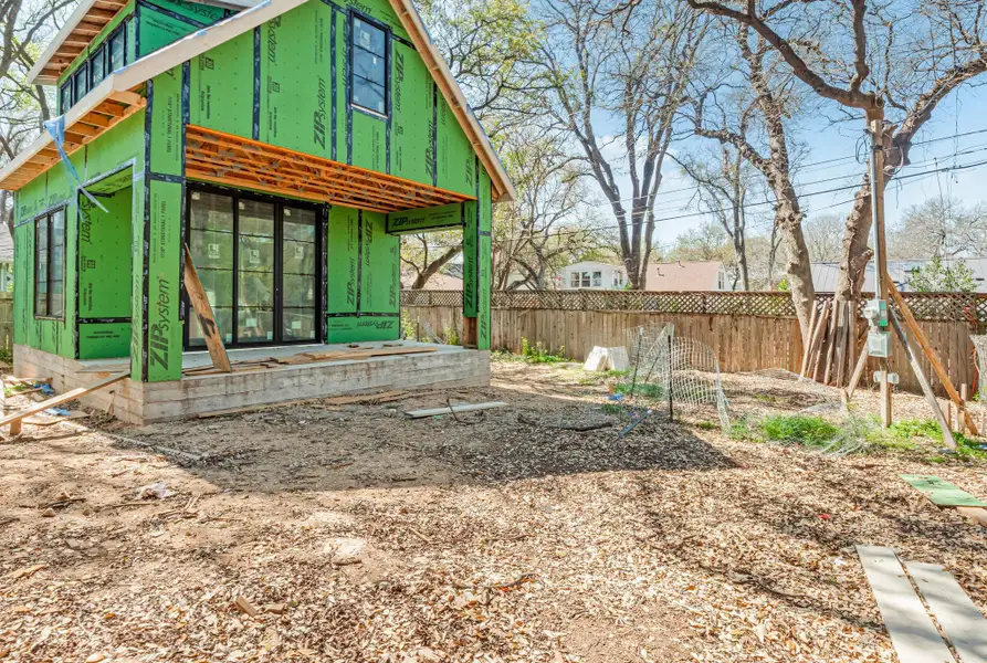 Back of property featuring fence