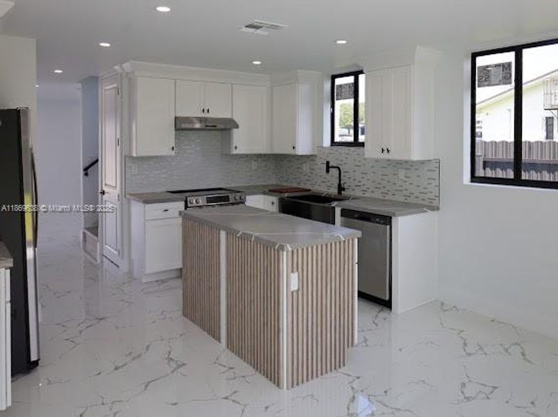 Furnished interior view inside a new home in , Miami (Image 3).