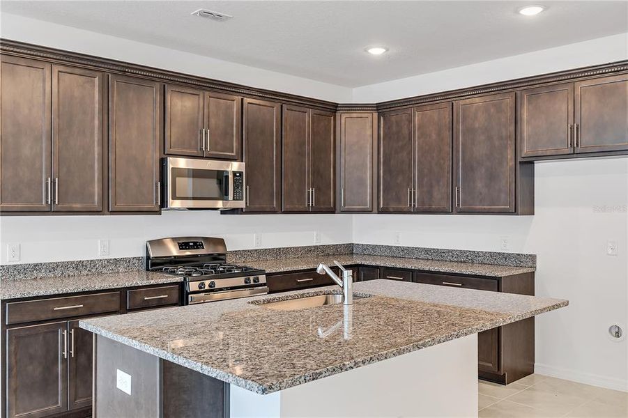 Furnished interior view inside a new home in Osprey Ranch Townhomes, Winter Garden (Image 11).
