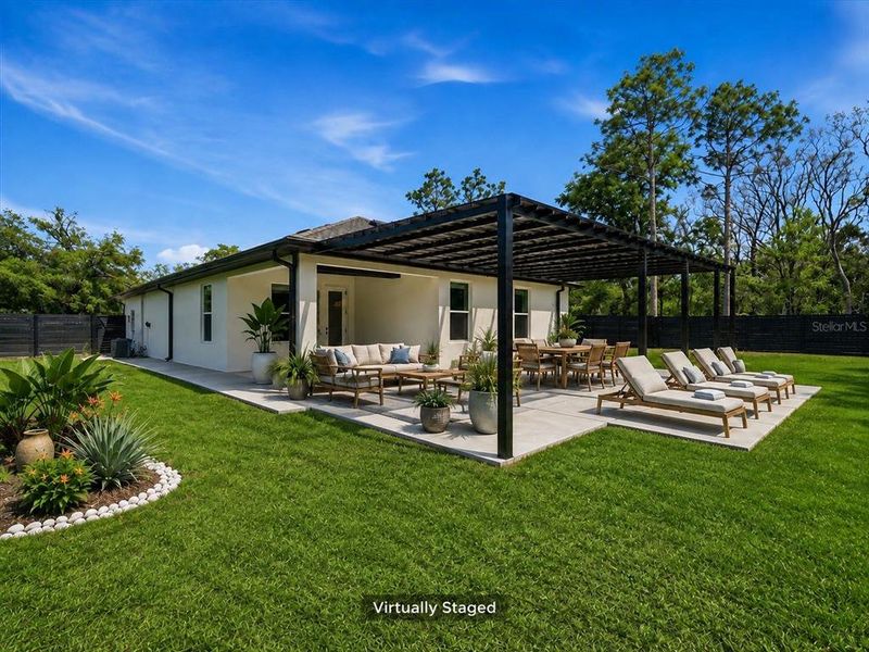 Exterior details and patio area of a home in , Spring Hill (Image 36).