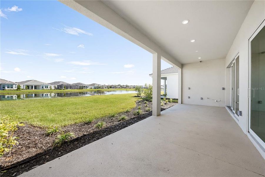 Exterior details and patio area of a home in Esplanade at Skye Ranch, Sarasota (Image 25).