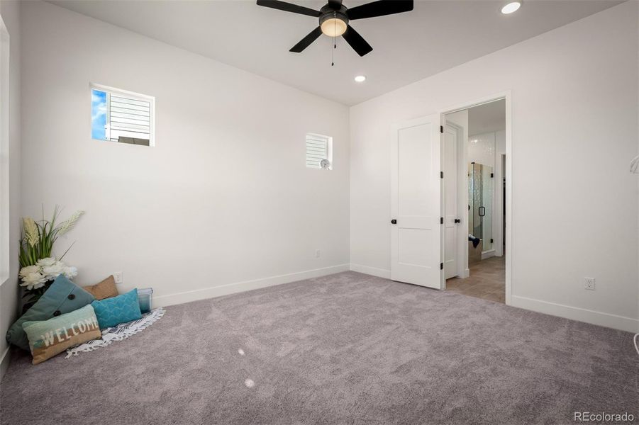 Spacious, unfurnished interior of a new home in Revel Crossing at Wolf Ranch - The Panorama Collection, Colorado Springs (Image 27).