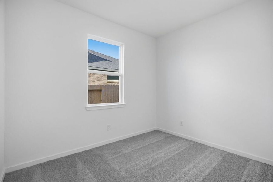 Spacious, unfurnished interior of a new home in Raburn Reserve 50s, Tomball (Image 13).