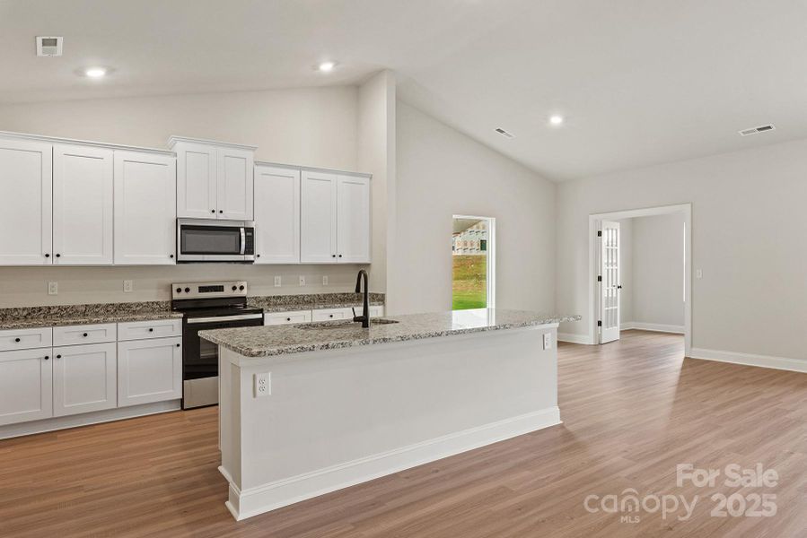 Furnished interior view inside a new home in Ascot Woods, Charlotte (Image 3).