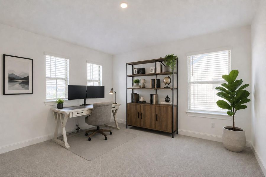 A well-lit study with ample desk space and integrated shelving for a productive home office environment. A well-lit study with ample desk space and integrated shelving for a productive home office environment.