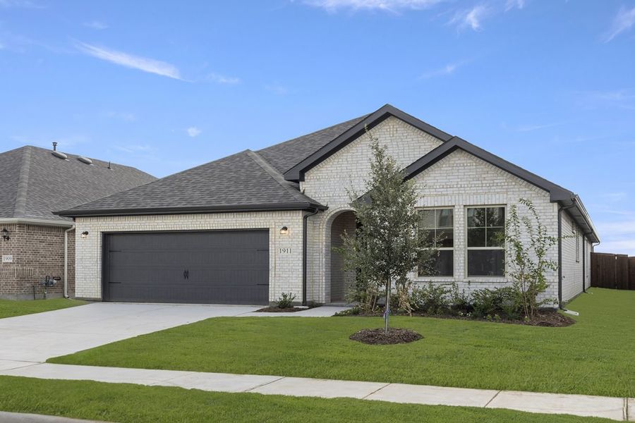 Representative exterior photo of a completed home built from the Hunters Crossing Hickory 2240 by Brohn Homes in Hunters Crossing, Sealy, TX (Image 2). Representative exterior photo of a completed home built from the Hunters Crossing Hickory 2240 by Brohn Homes in Hunters Crossing, Sealy, TX (Image 2).