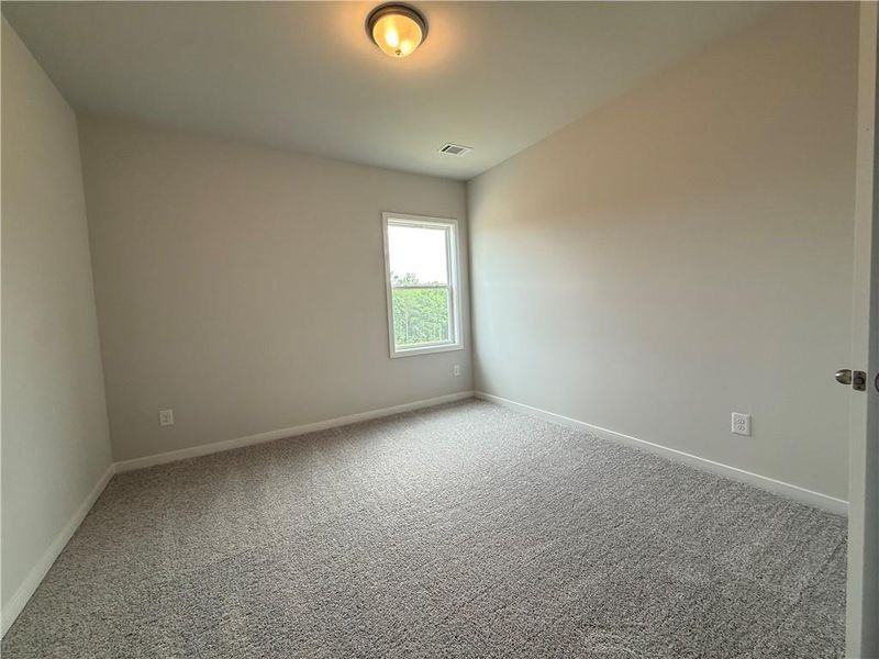 Spacious, unfurnished interior of a new home in Ponderosa Farms Manor, Gainesville (Image 32).