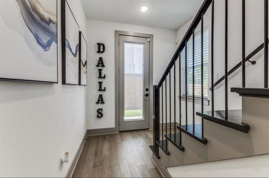 Foyer and exit to side yard