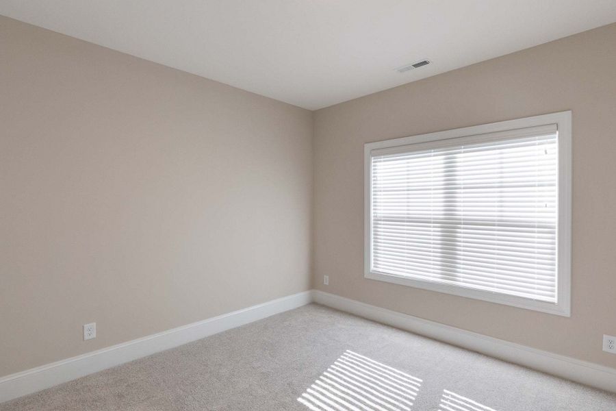 Representative unfurnished interior of a home built from the Carver by Caviness & Cates Communities in Maggie Way, Wendell (Image 139).