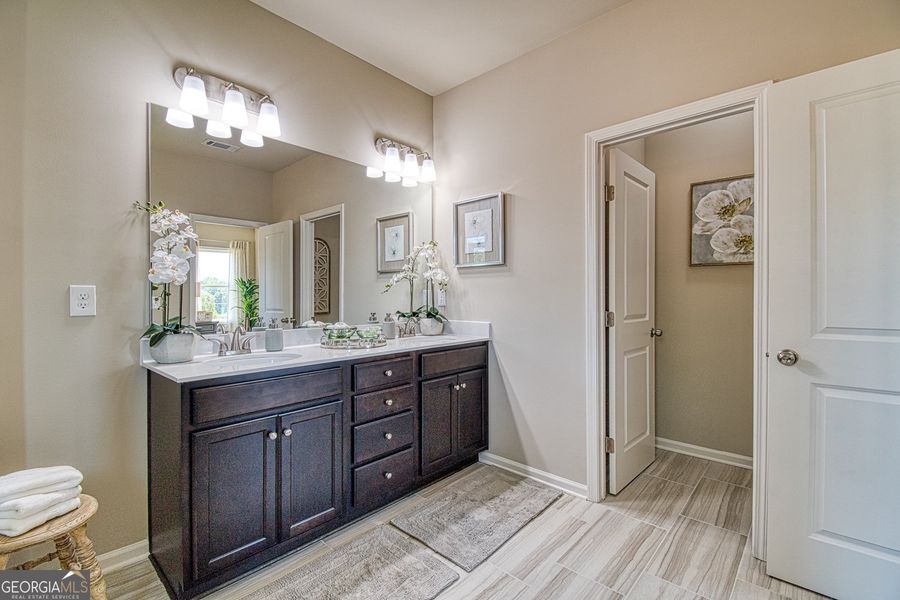 Furnished interior view inside a new home in Millstone at Mundy Mill, Gainesville (Image 18). Furnished interior view inside a new home in Millstone at Mundy Mill, Gainesville (Image 18).