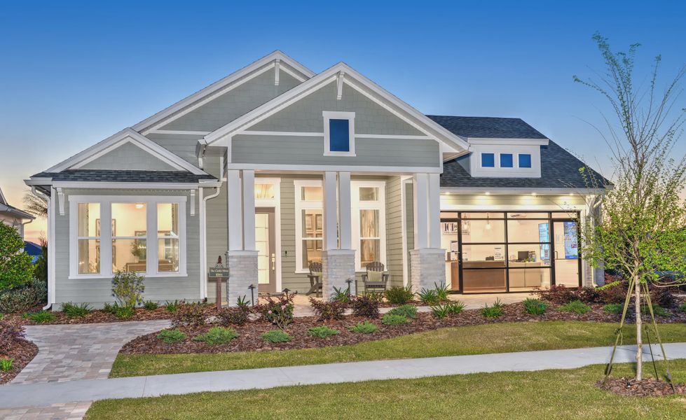 Front exterior of a new home in Oakmont, Gainesville, FL, highlighting curb appeal (Image 1).
