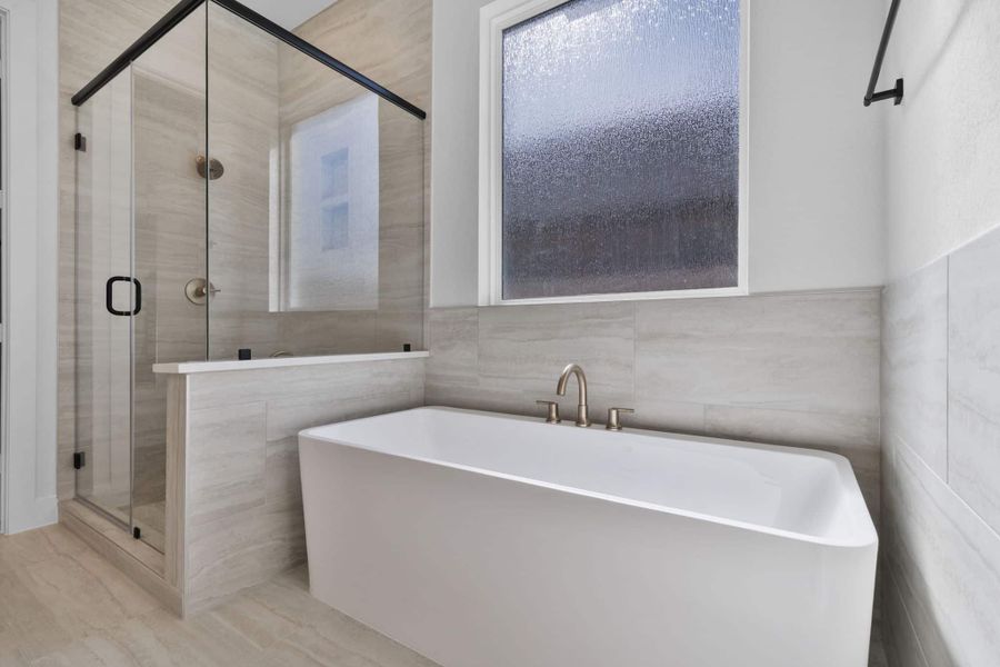 Representative furnished interior of a home built from the Summerton by Chesmar Homes in Grange, Katy (Image 8).