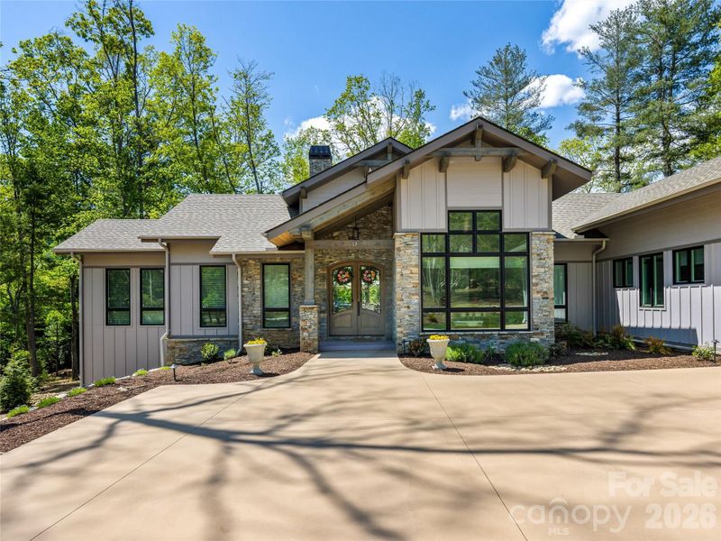 Front exterior of a new home in , Arden, NC, highlighting curb appeal (Image 26).