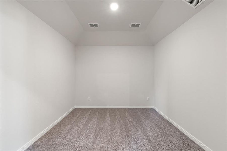 This spacious media room is the perfect place to host family movie night or big game day parties!