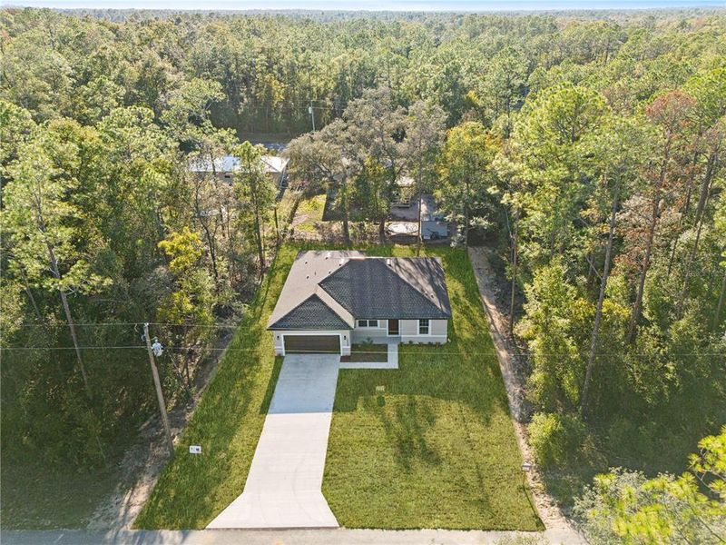 Front exterior of a new home in , Citrus Springs, FL, highlighting curb appeal (Image 2).