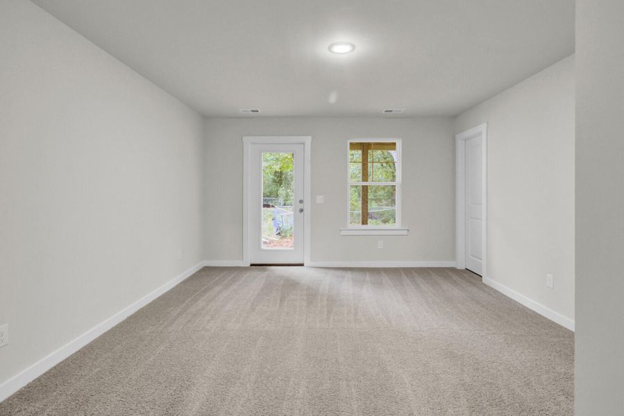Spacious, unfurnished interior of a new home in Indigo Grove Townhomes, Johns Island (Image 32).