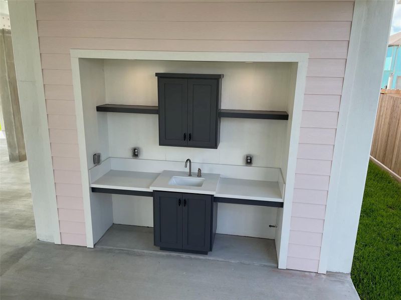 Exterior details and patio area of a home in , Bayou Vista (Image 3).