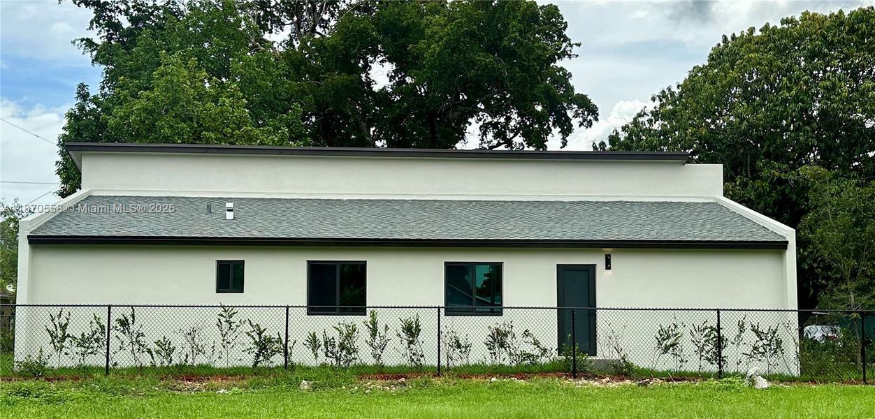 Front exterior of a new home in , Miami, FL, highlighting curb appeal (Image 27).