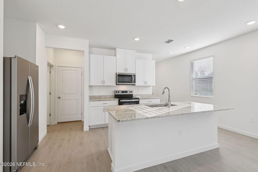 Furnished interior view inside a new home in Cypress Meadows - The Villas, Jacksonville (Image 5).