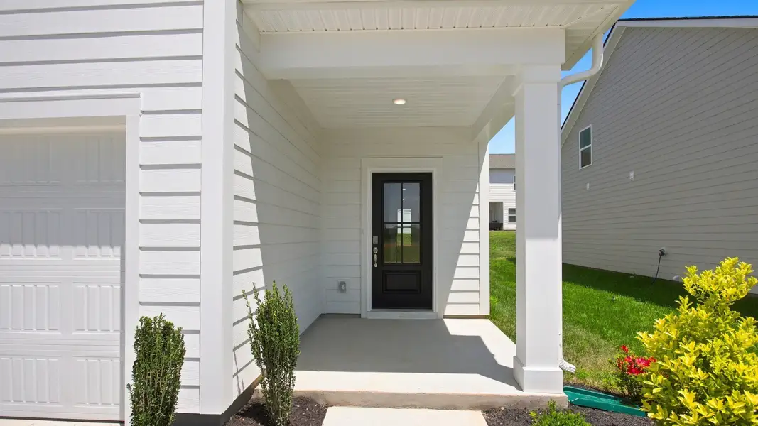 Closer view of porch and front door Closer view of porch and front door