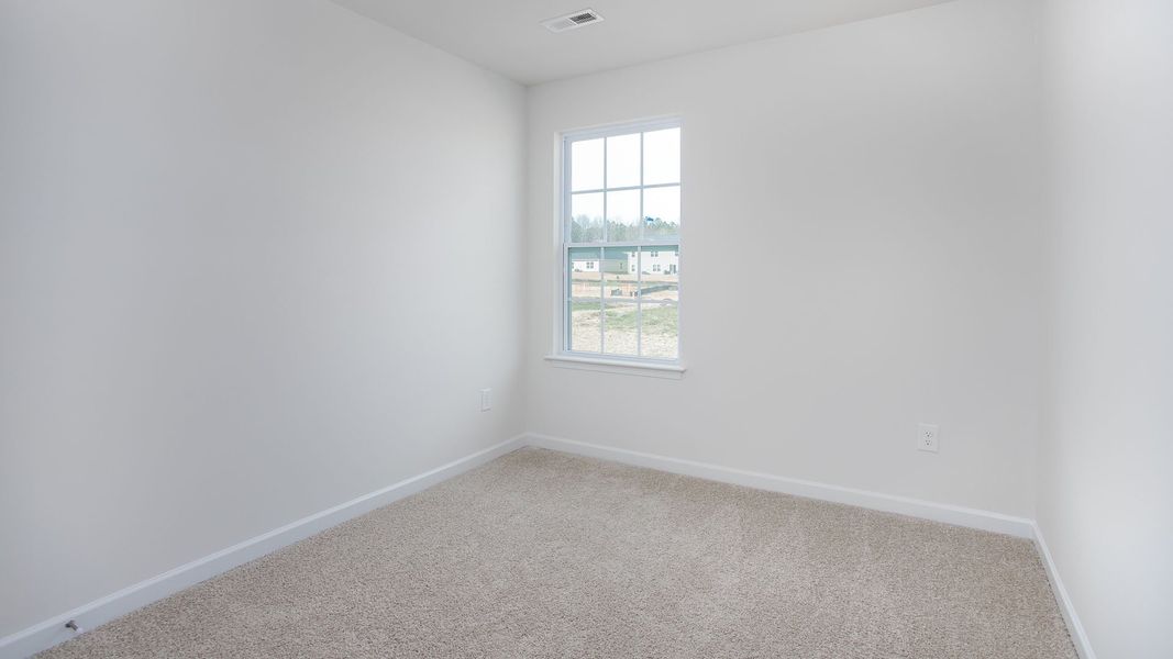 Spacious, unfurnished interior of a new home in The Gables at Edinborough Townes, Gibsonville (Image 19).