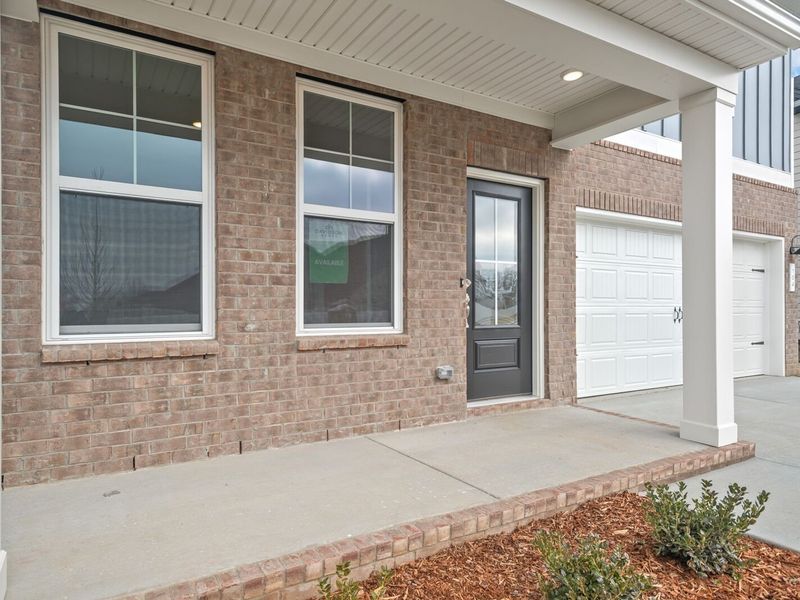 Exterior details and patio area of a home in Woods Crossing, Gallatin (Image 3).
