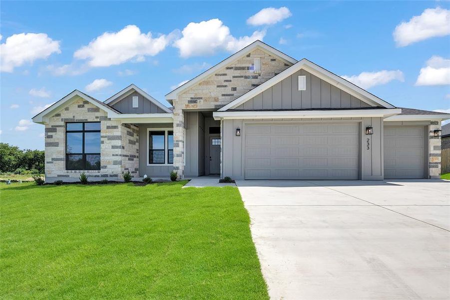 Front exterior of a new home in Rosenthal Estates, Lorena, TX, highlighting curb appeal (Image 1). Front exterior of a new home in Rosenthal Estates, Lorena, TX, highlighting curb appeal (Image 1).