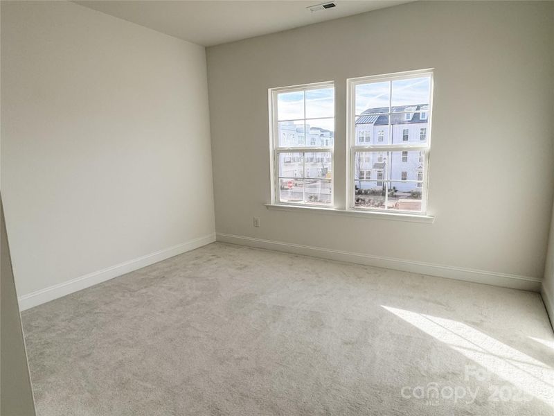Spacious, unfurnished interior of a new home in The River District Townhomes, Charlotte (Image 15).