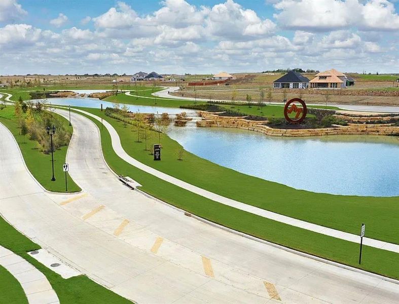 View of home's community featuring a water view View of home's community featuring a water view