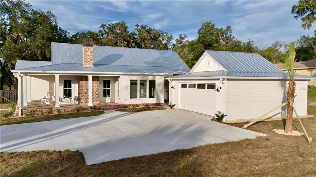 This two car oversized garage will hold today's larger vehicles in addition to the extra long and wide driveway.