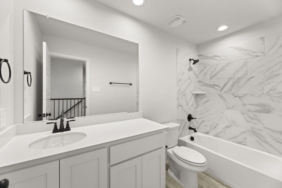 Front exterior of a new home in Sereno Oaks at Buckner Terrace, Dallas, TX, highlighting curb appeal (Image 18). Front exterior of a new home in Sereno Oaks at Buckner Terrace, Dallas, TX, highlighting curb appeal (Image 18).