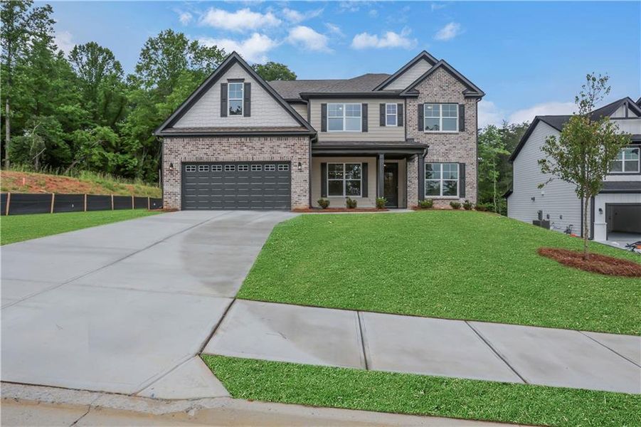 Front exterior of a new home in Arbor West, Dawsonville, GA, highlighting curb appeal (Image 25).