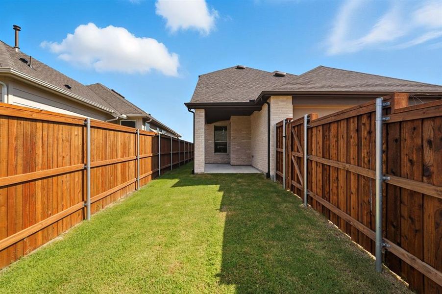 Exterior details and patio area of a home in Waterscape: 40ft. lots, Royse City (Image 2). Exterior details and patio area of a home in Waterscape: 40ft. lots, Royse City (Image 2).