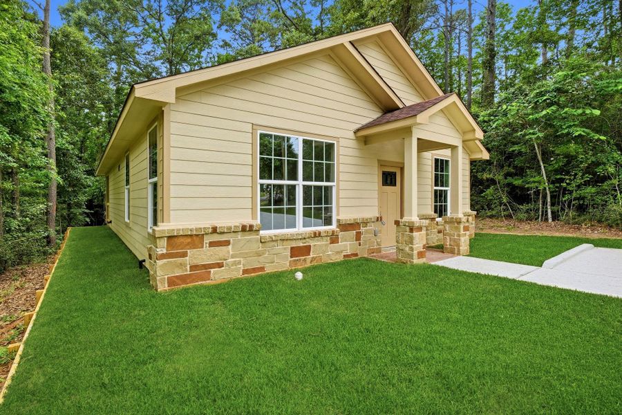 Exterior details and patio area of a home in , Coldspring (Image 19). Exterior details and patio area of a home in , Coldspring (Image 19).