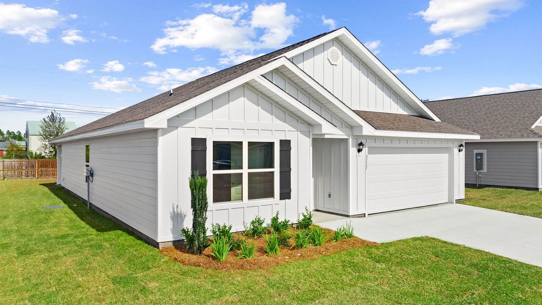 Front exterior of a new home in Park Place, Panama City, FL, highlighting curb appeal (Image 20). Front exterior of a new home in Park Place, Panama City, FL, highlighting curb appeal (Image 20).