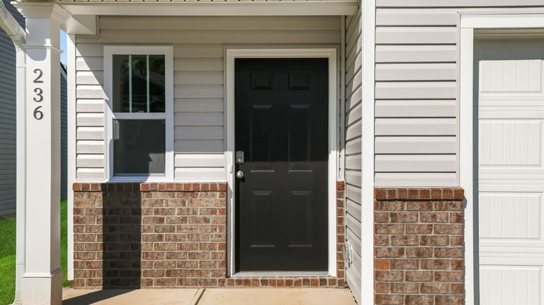 Exterior details and patio area of a home in Durbin Meadows, Fountain Inn (Image 3).