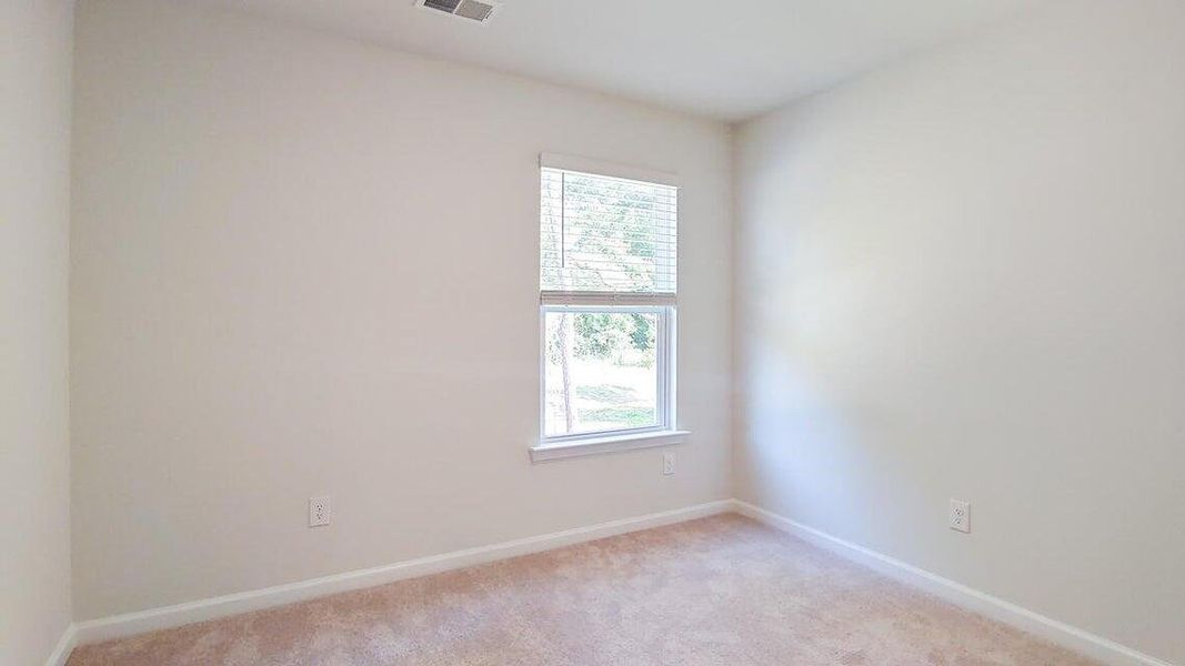 Spacious, unfurnished interior of a new home in Garbon Fields, Summerville (Image 24).