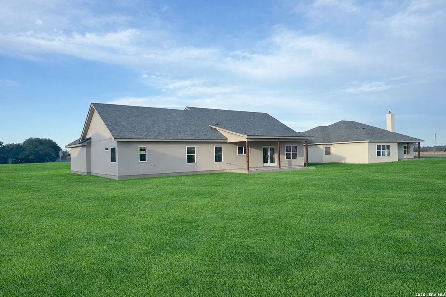 Exterior details and patio area of a home in , Hondo (Image 4).