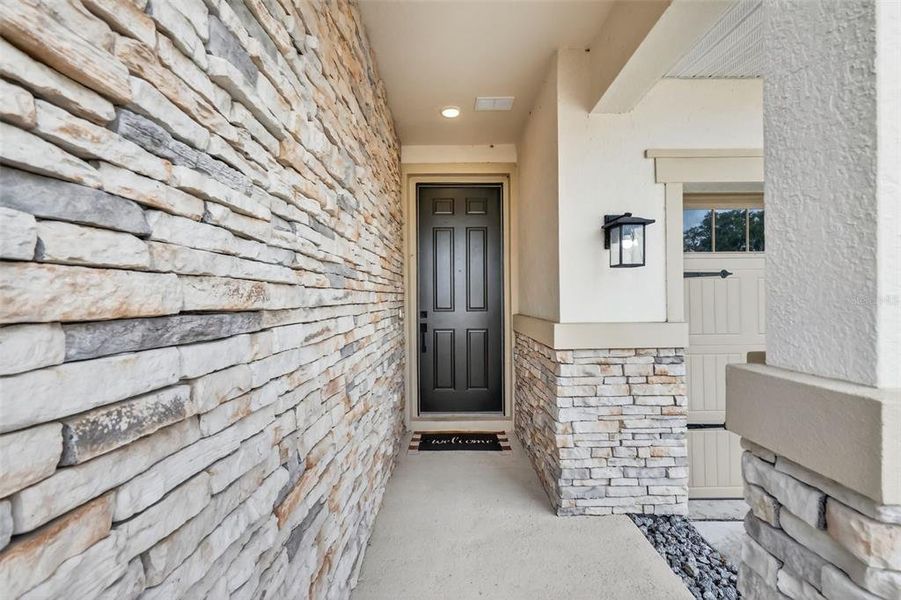 Exterior details and patio area of a home in Seasons at Spring Creek, Okahumpka (Image 27). Exterior details and patio area of a home in Seasons at Spring Creek, Okahumpka (Image 27).