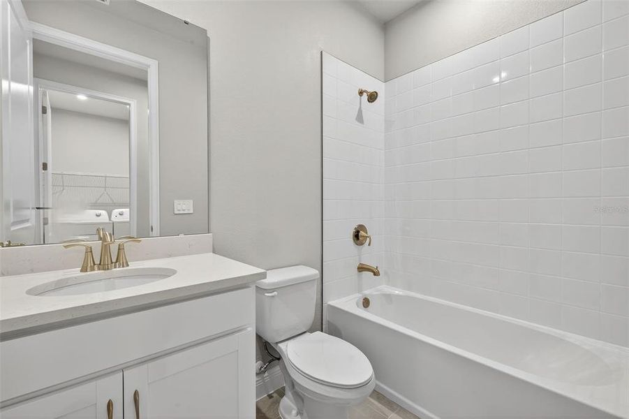 Furnished interior view inside a new home in Windwater, Parrish (Image 15).