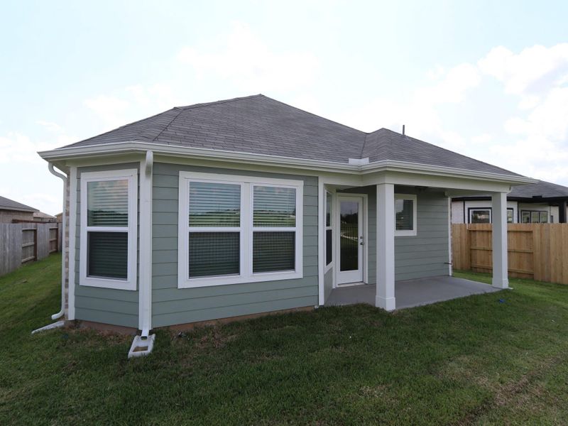 Front exterior of a new home in Miller's Pond, Rosenberg, TX, highlighting curb appeal (Image 10). Front exterior of a new home in Miller's Pond, Rosenberg, TX, highlighting curb appeal (Image 10).