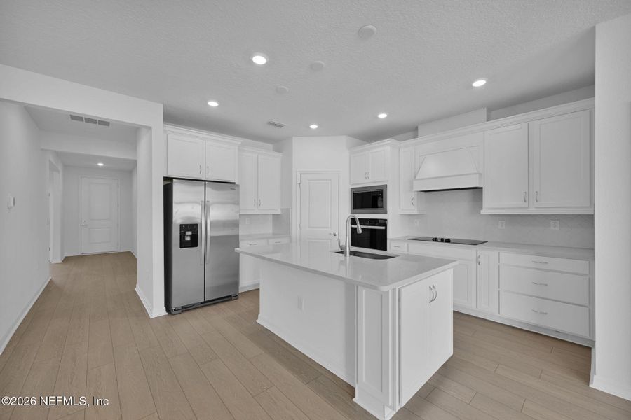 Furnished interior view inside a new home in Hyland Trail, Green Cove Springs (Image 5).