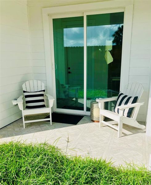 Inviting covered patio oasis perfect for relaxation.