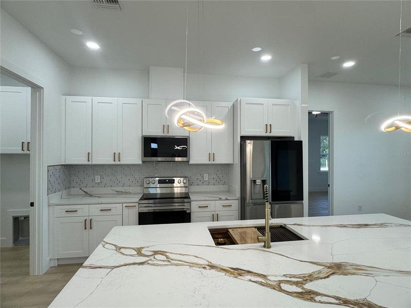 Furnished interior view inside a new home in , Frostproof (Image 6).