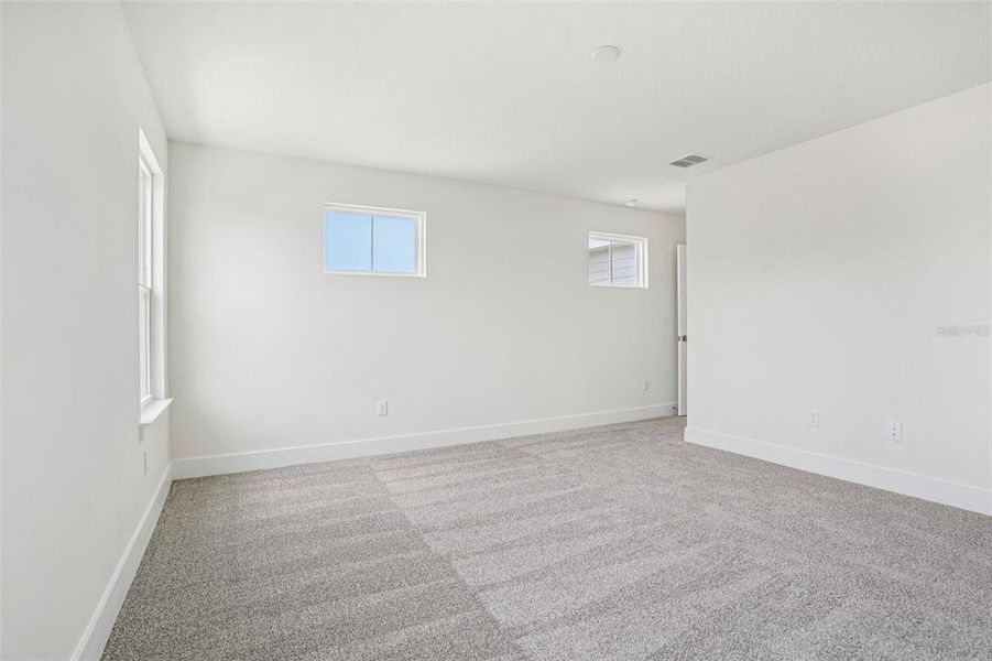 Spacious, unfurnished interior of a new home in Trailside, Mount Dora (Image 30).
