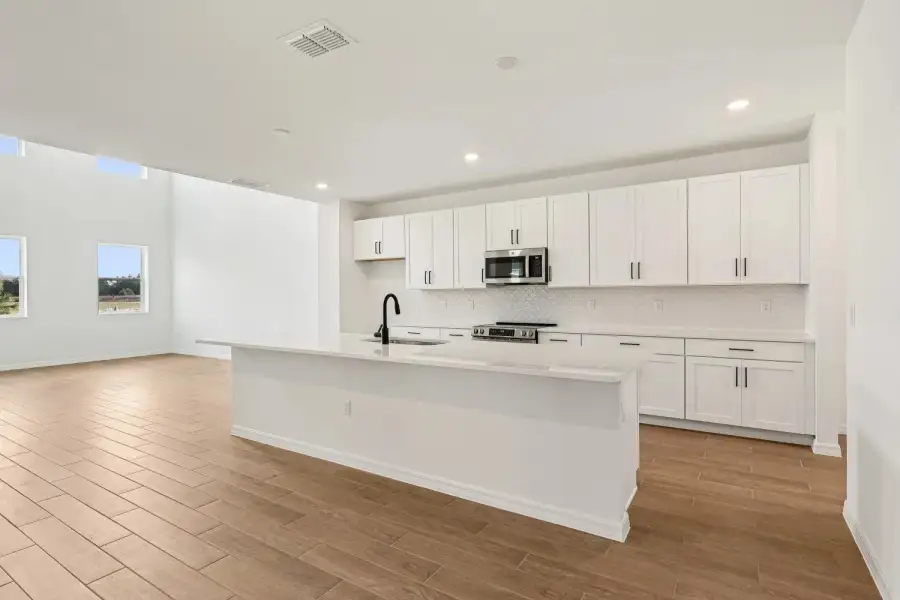 Furnished interior view inside a new home in Northlake at Ovation, Winter Garden (Image 5).