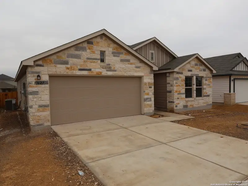 Front exterior of a new home in Winding Brook, San Antonio, TX, highlighting curb appeal (Image 1). Front exterior of a new home in Winding Brook, San Antonio, TX, highlighting curb appeal (Image 1).