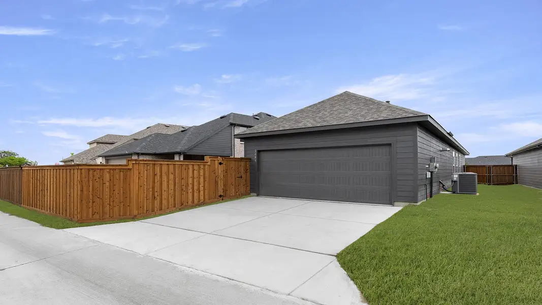 Front exterior of a new home in Waterscape, Royse City, TX, highlighting curb appeal (Image 22).
