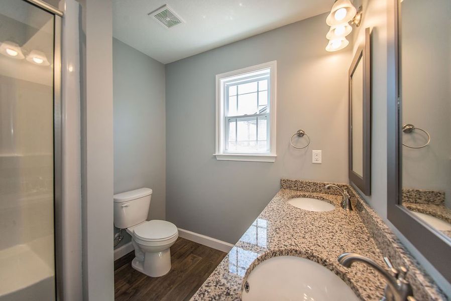 Representative furnished interior of a home built from the Jackson by Enchanted Homes in Lonesome Dove, San Antonio (Image 29).
